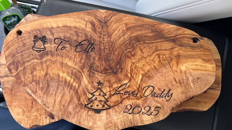 Engraved olive wood serving board